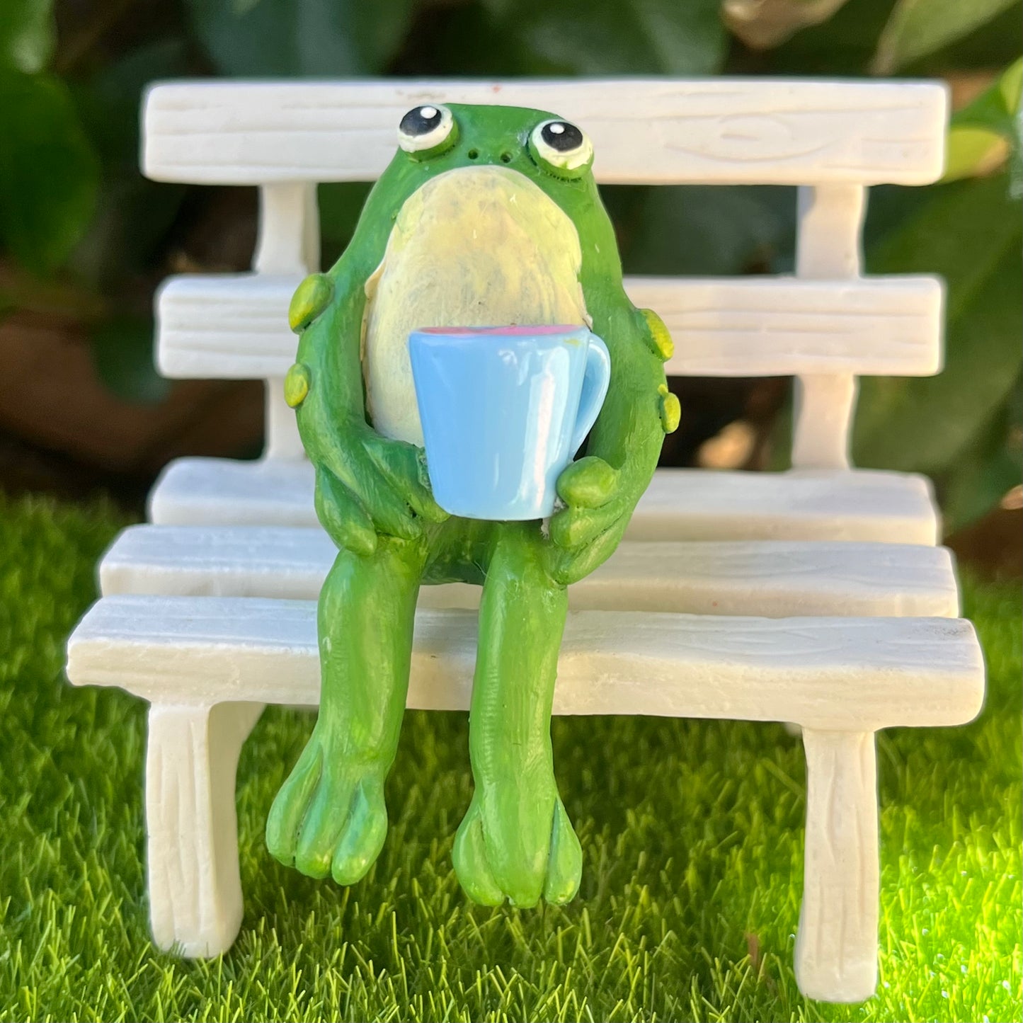 Handmade sitting toad with mug figurine