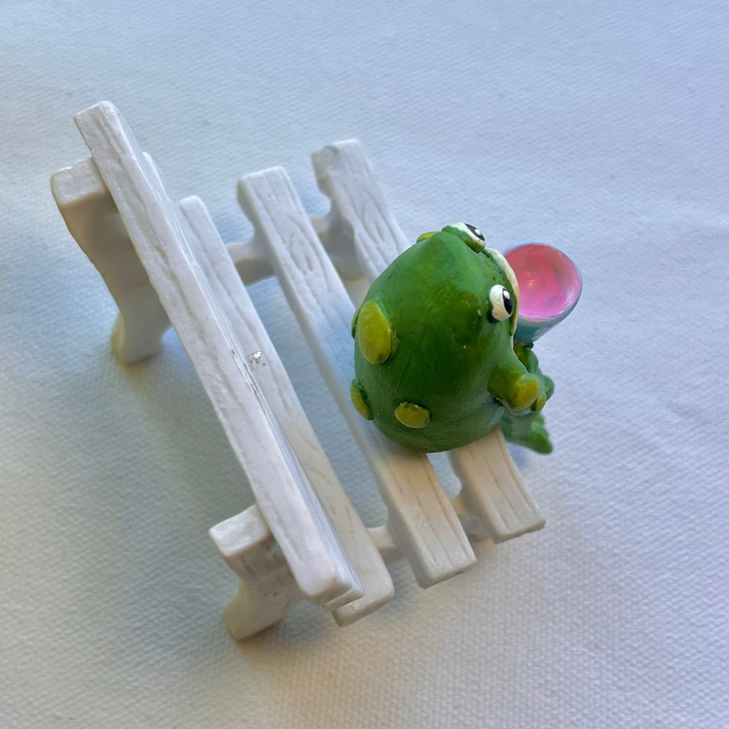 Handmade sitting toad with mug figurine