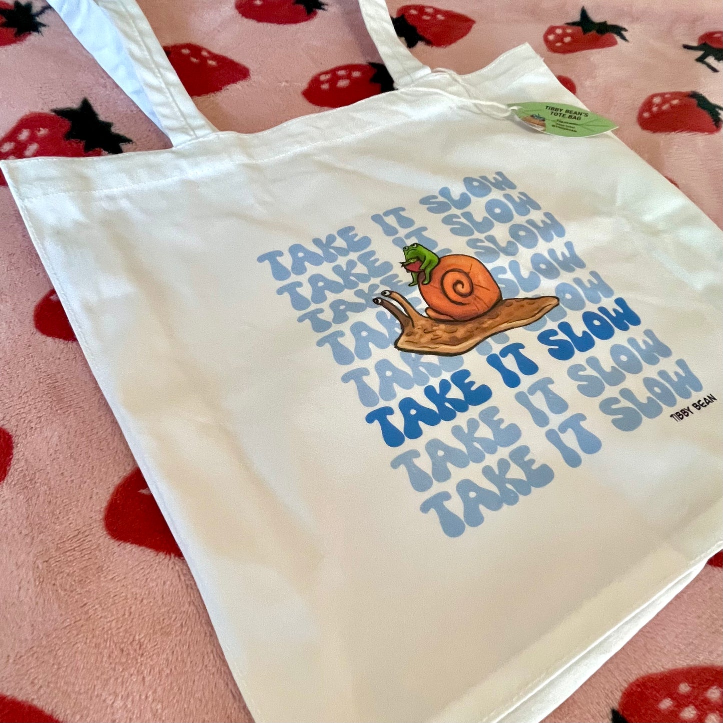 “Take it slow” snail and frog tote bag