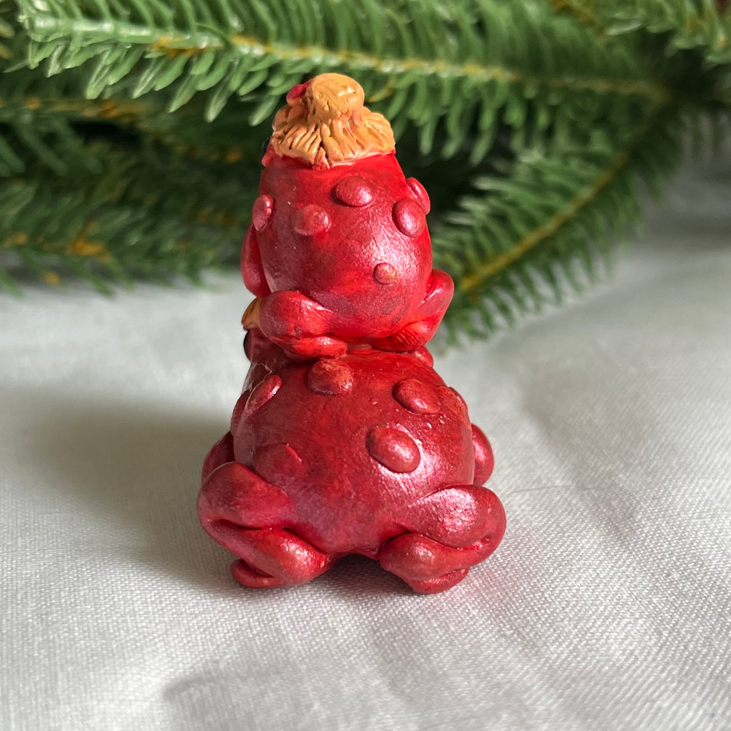 Handmade stacking red mistletoe hat toad figurine
