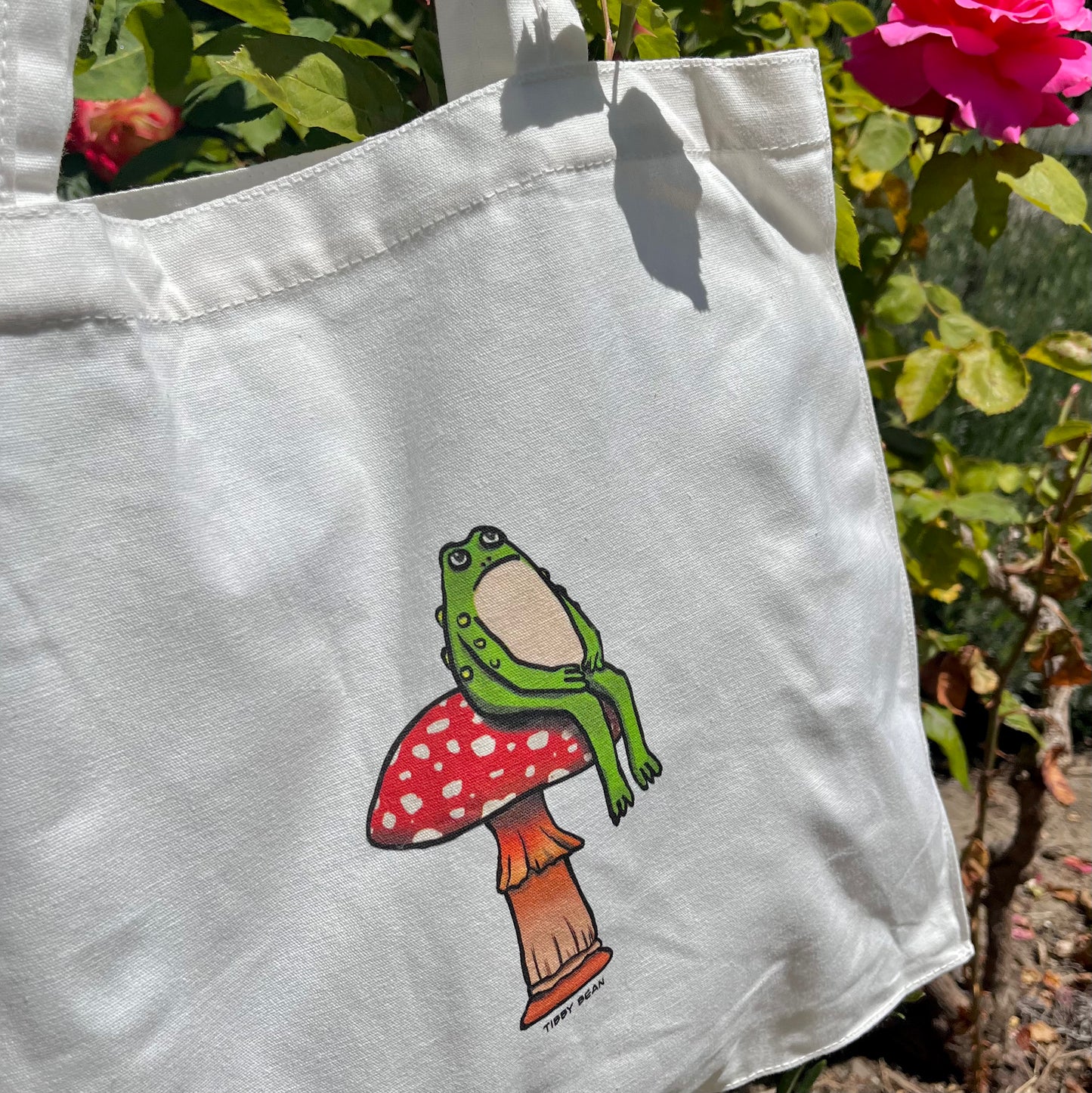Sitting Toad on Mushroom Tote Bag