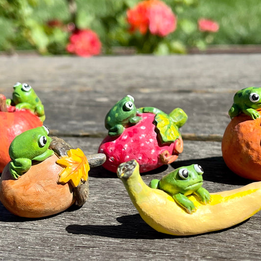 Handmade polymer clay little frogs on fruits figurines