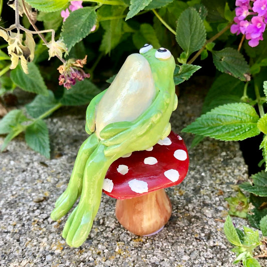 Handmade polymer clay toad sitting on mushroom figurine set