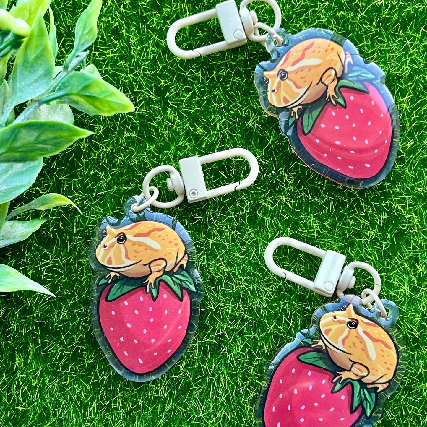 Pacman frog on strawberry keychain