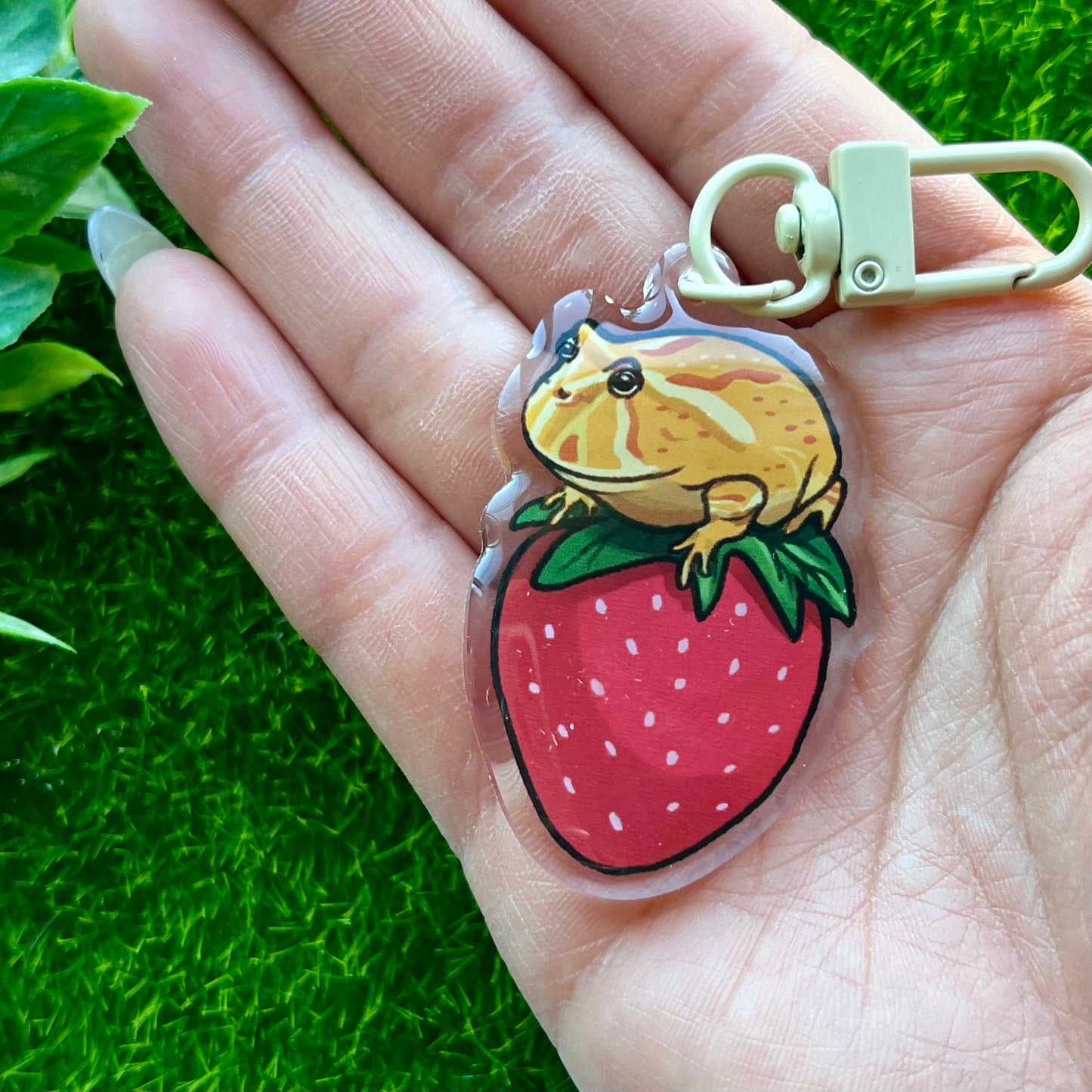 Pacman frog on strawberry keychain