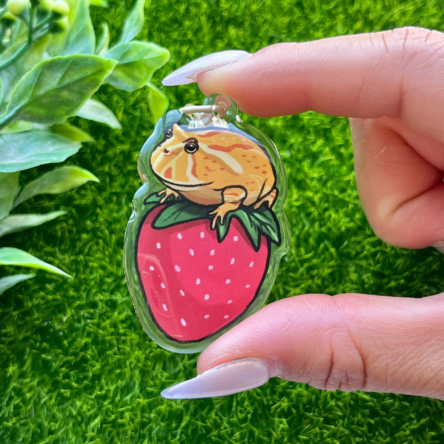 Pacman frog on strawberry keychain