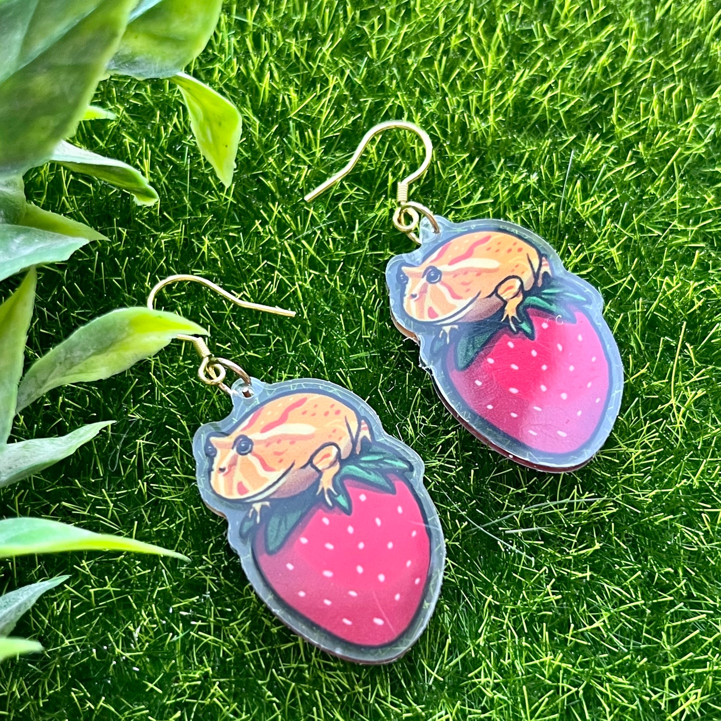 Pacman frog on strawberry acrylic earrings