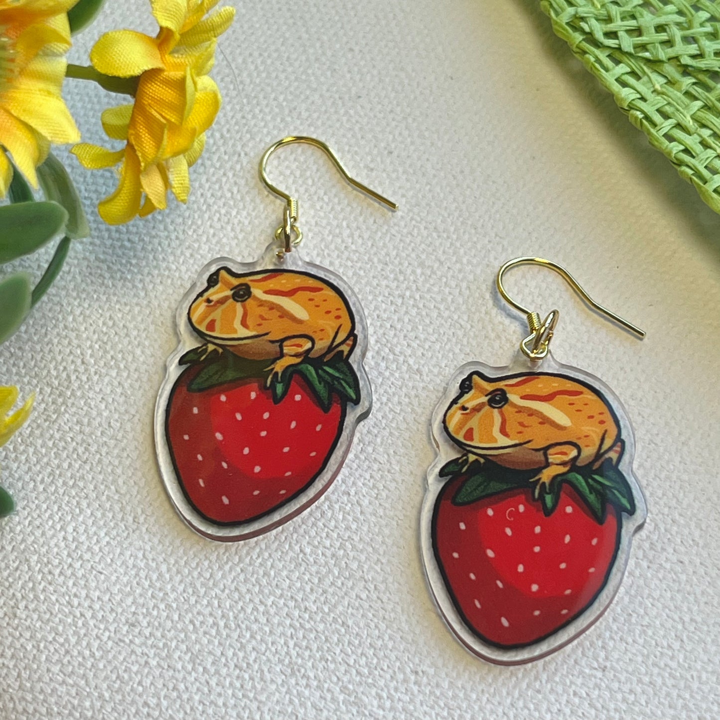 Pacman frog on strawberry acrylic earrings