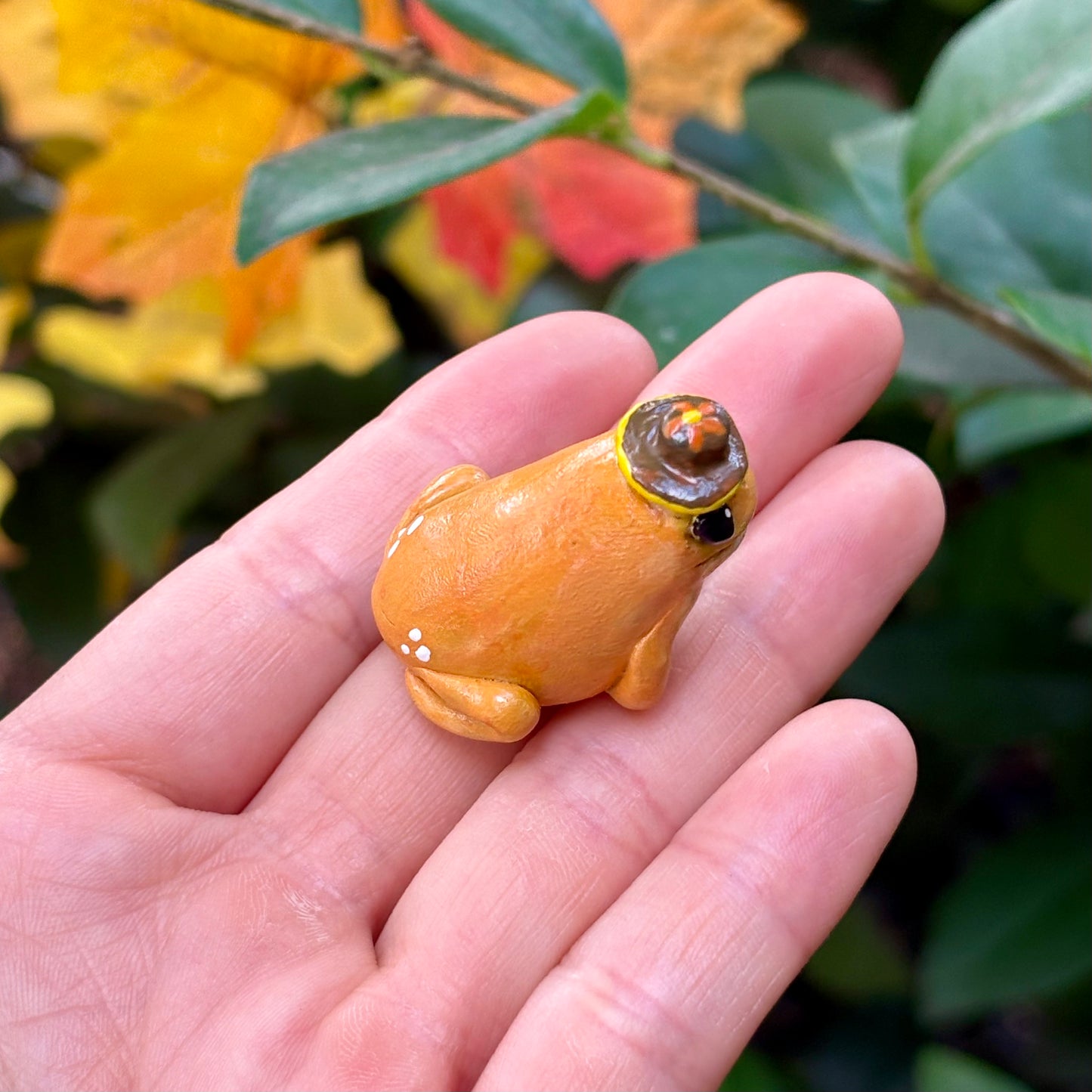 Handmade bucket hat tree frog figurine