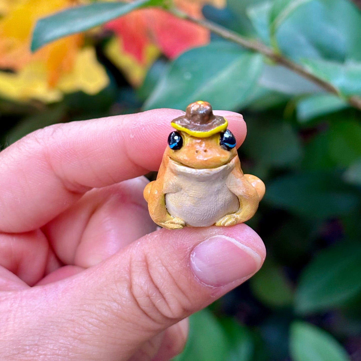 Handmade bucket hat tree frog figurine