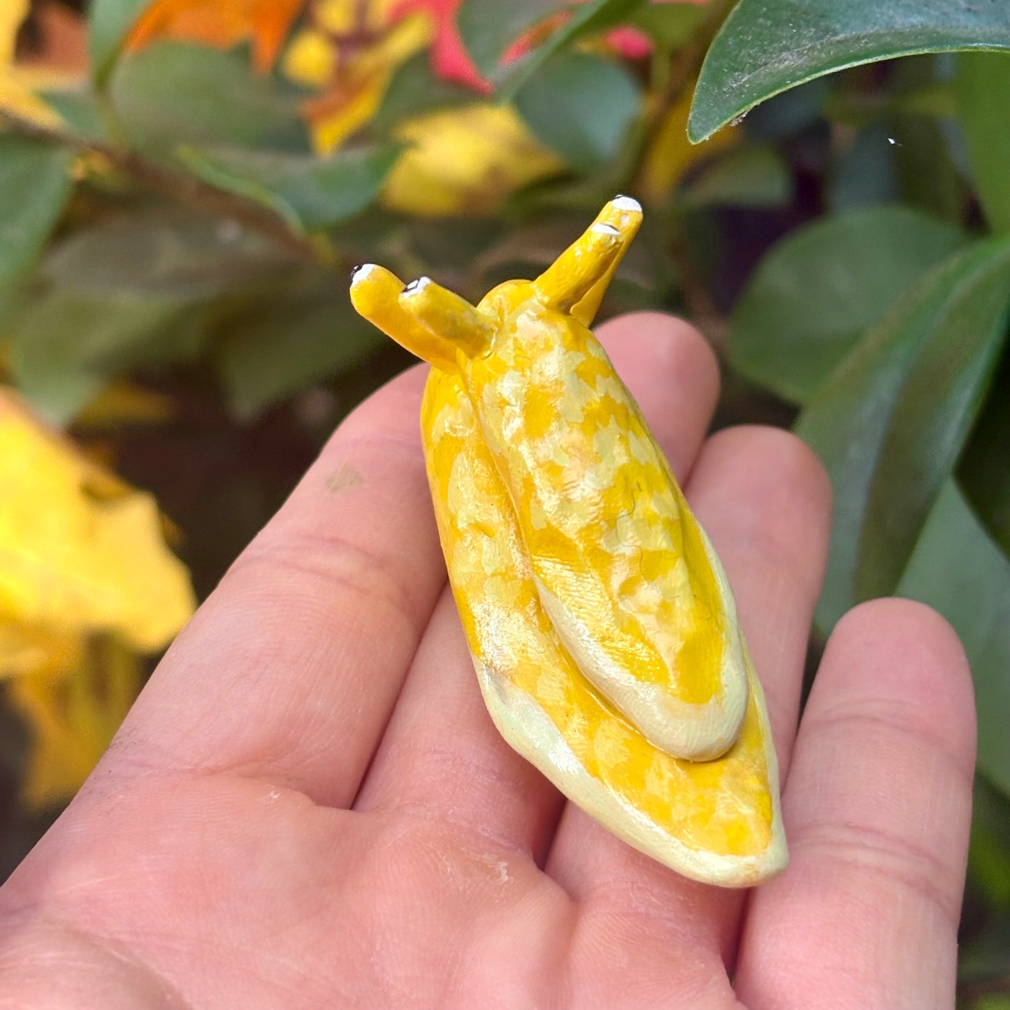 Handmade stacking banana slug figurine