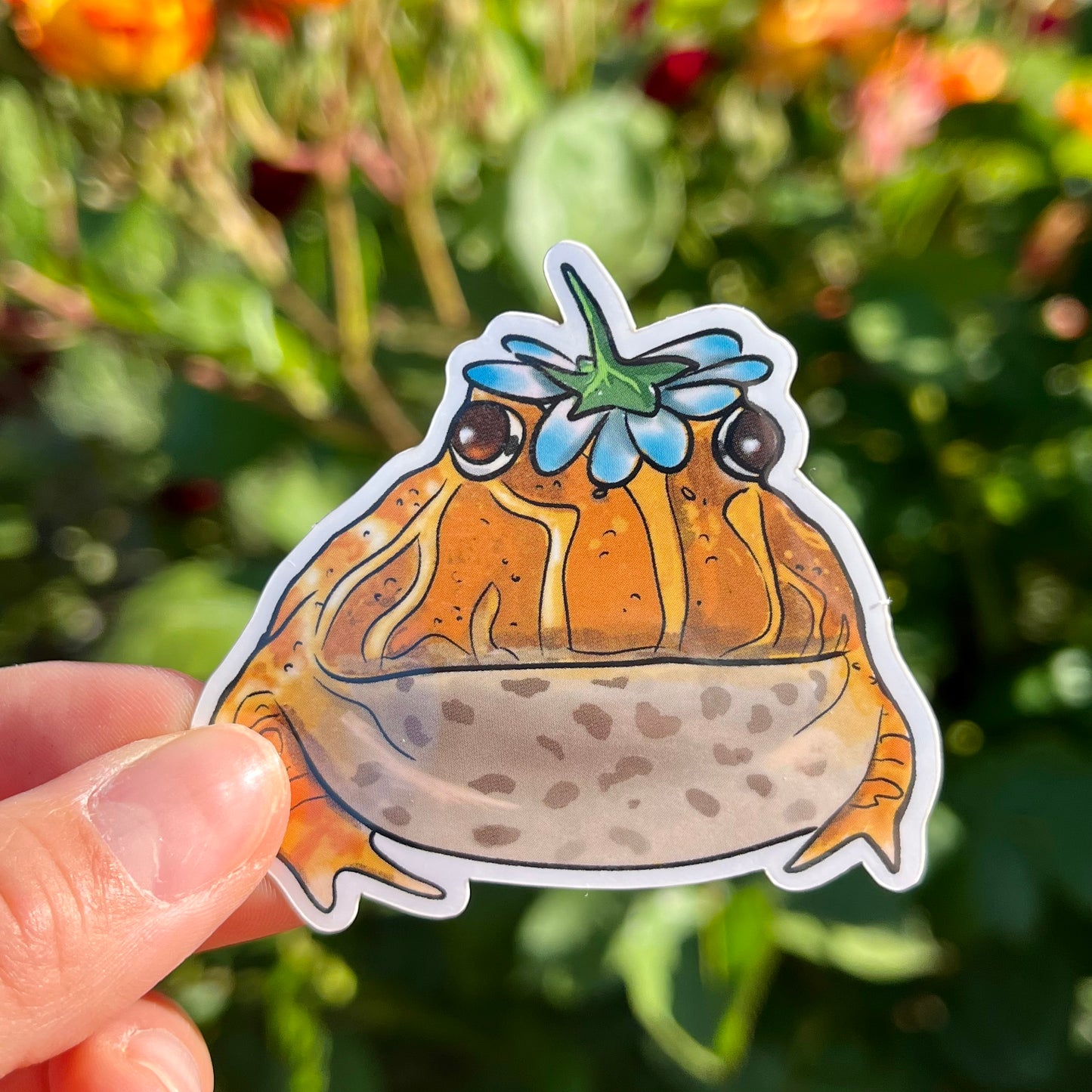 Vinyl "Tibby" the pacman frog with flower hat sticker