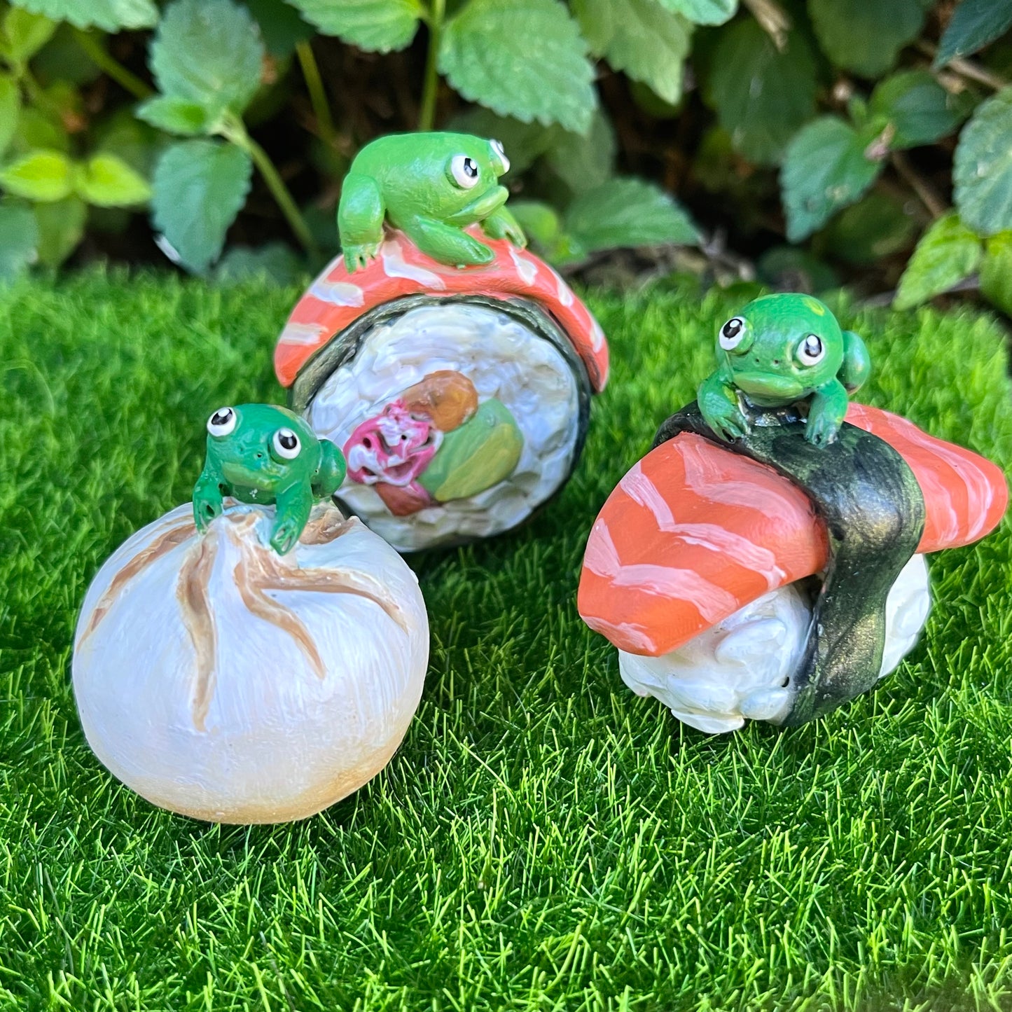 Handmade frogs on food (frushi) figurines