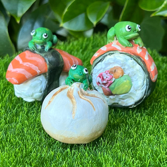 Handmade frogs on food (frushi) figurines