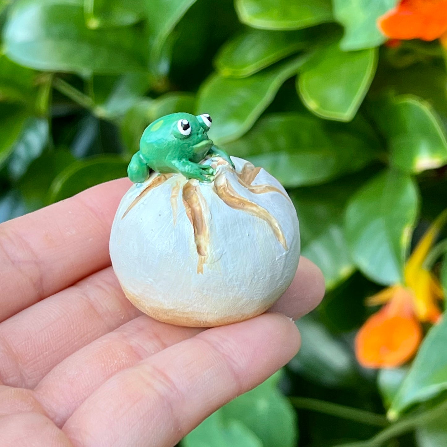 Handmade frogs on food (frushi) figurines