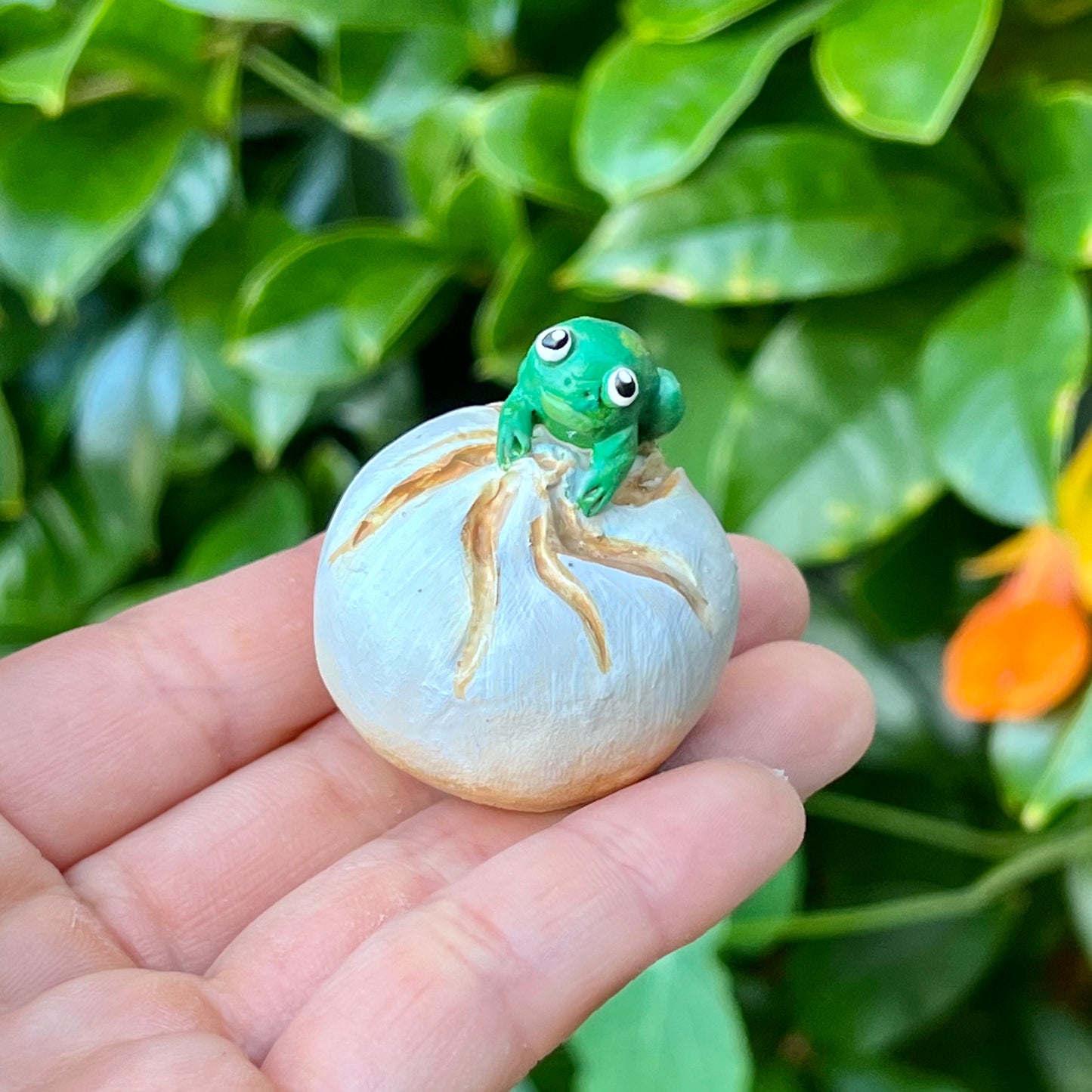 Handmade frogs on food (frushi) figurines