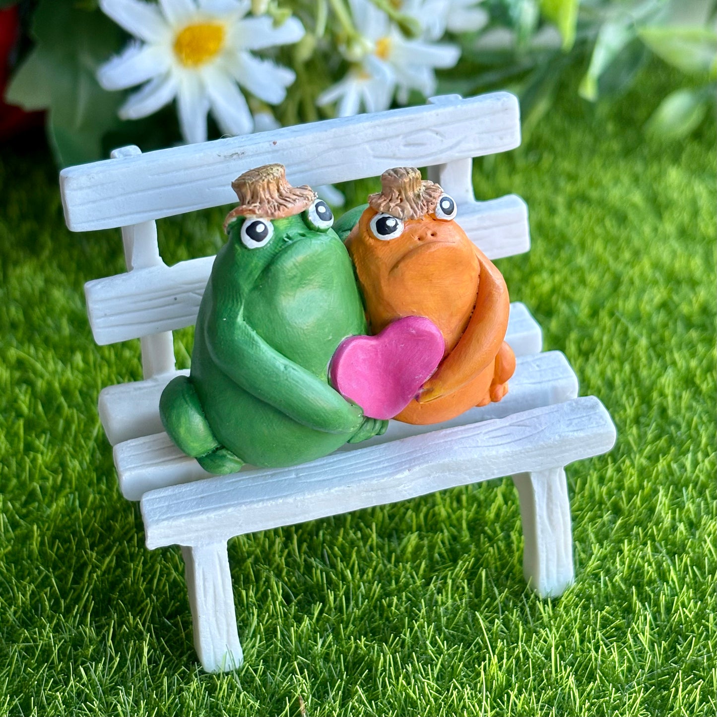 Handmade hugging frog friend figurine