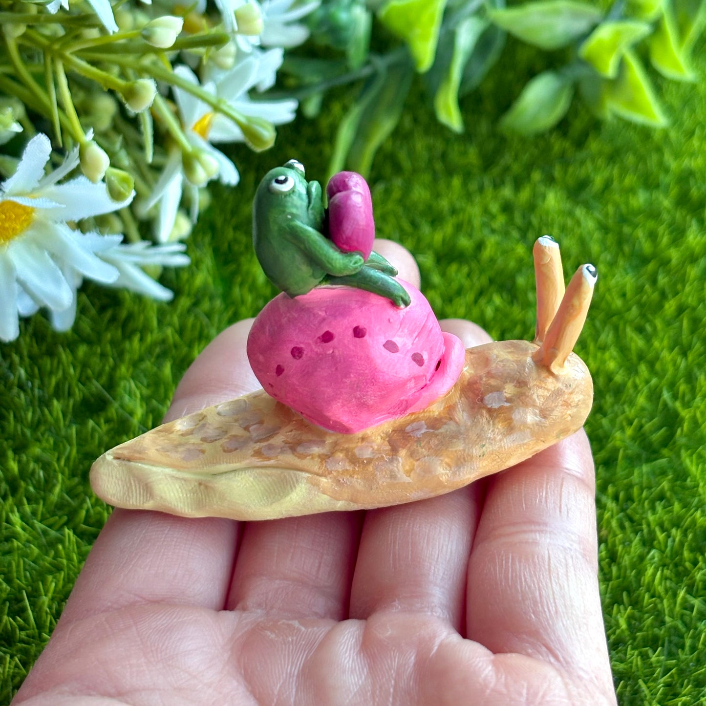 Handmade valentine's frog riding snail figurine