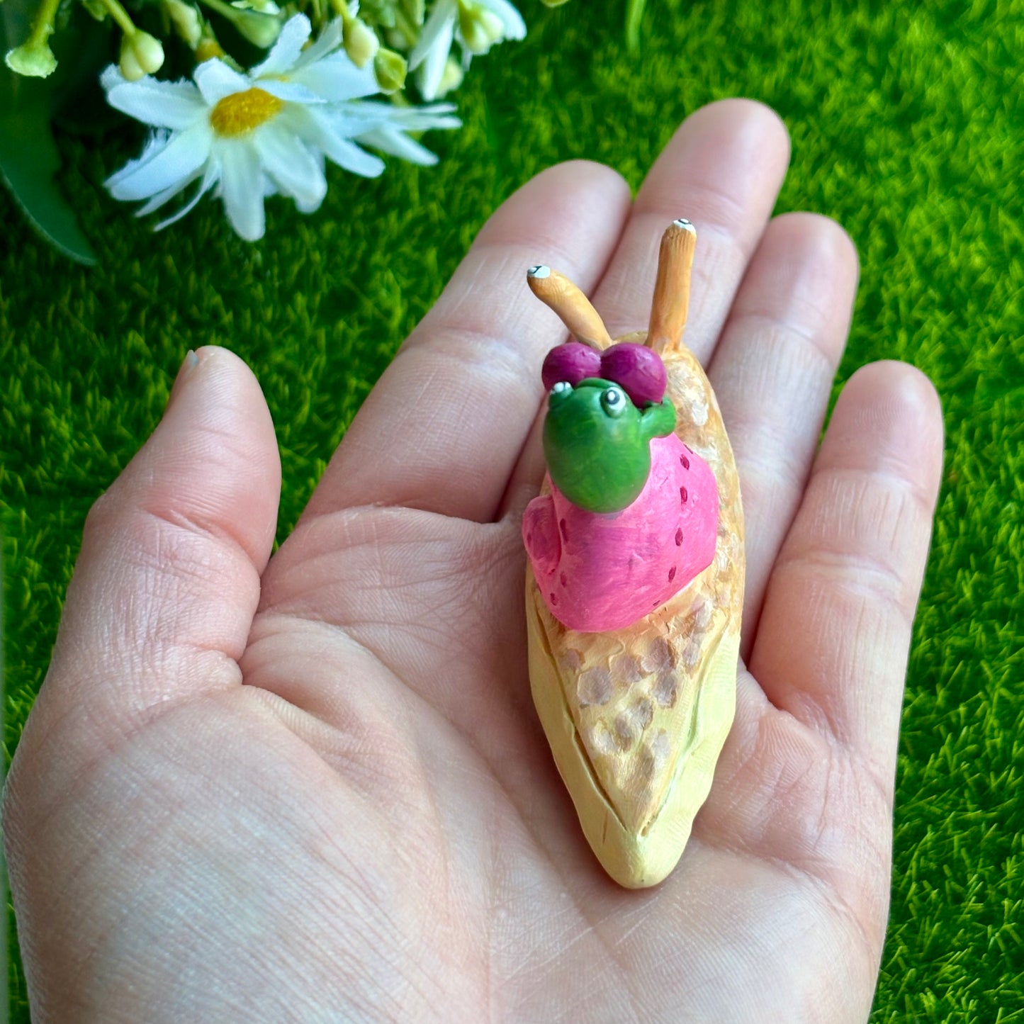 Handmade valentine's frog riding snail figurine